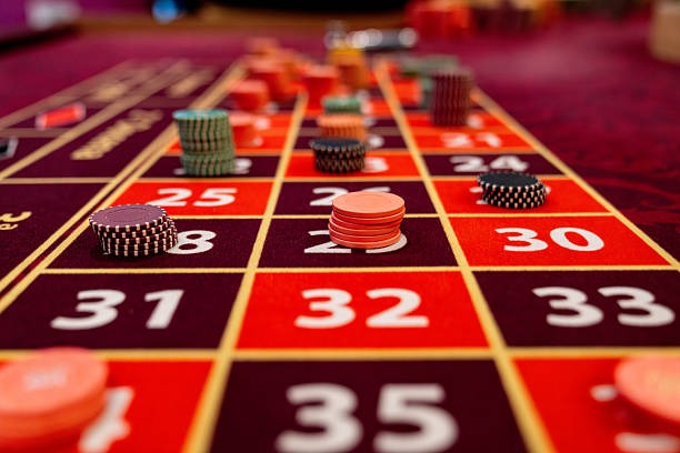 Slot game paytable showing symbol values and bonus features